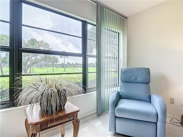 sitting room featuring light tile patterned floors