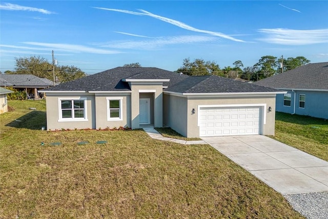 view of front of house with a garage and a front yard