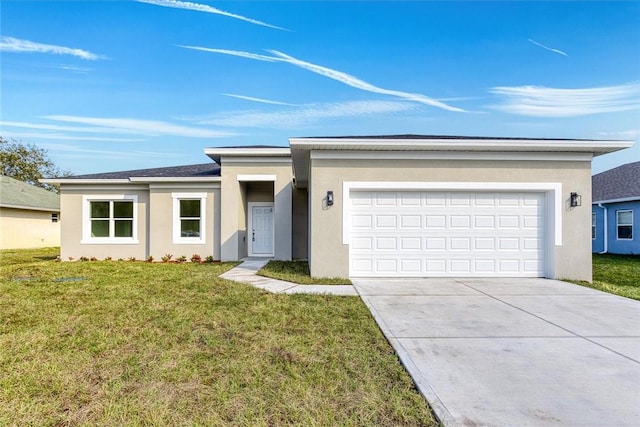 ranch-style house with a garage and a front yard