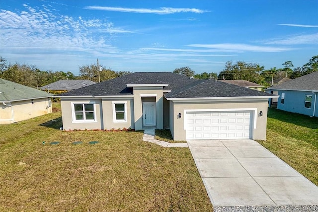 ranch-style house with a garage and a front lawn