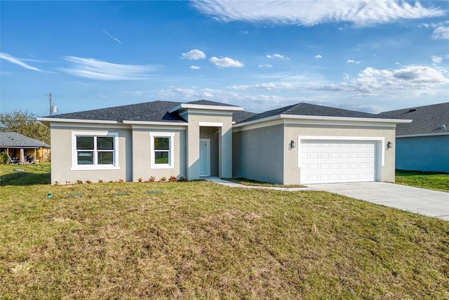 view of front facade featuring a garage and a front lawn