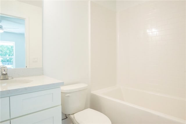 full bathroom with shower / tub combination, vanity, and toilet