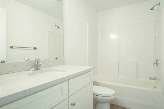 full bathroom featuring toilet, shower / bathing tub combination, and vanity