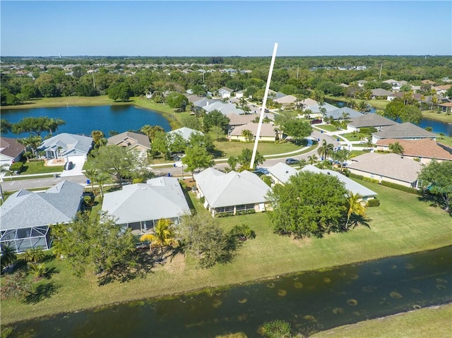 bird's eye view with a residential view and a water view