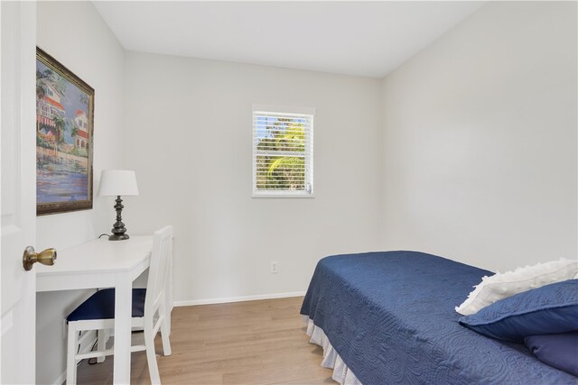 bedroom with light hardwood / wood-style floors