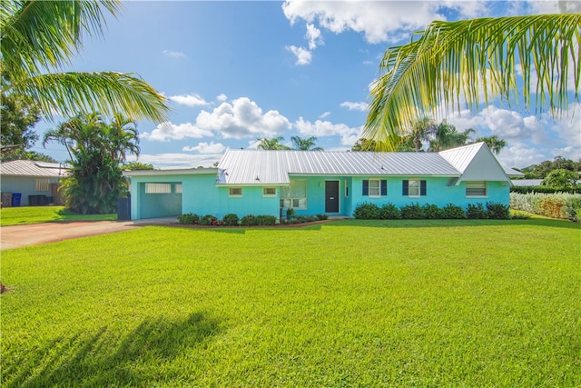 ranch-style home with a front yard