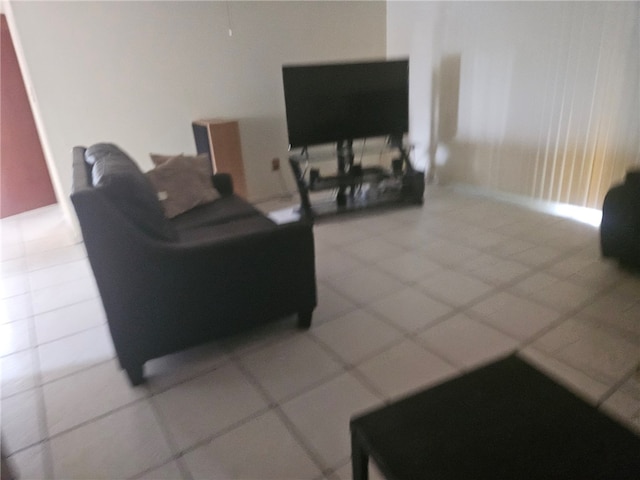 living room with tile patterned flooring