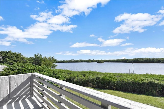 balcony featuring a water view