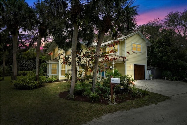 view of front of home with a garage and driveway