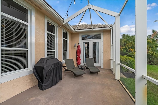 sunroom featuring french doors