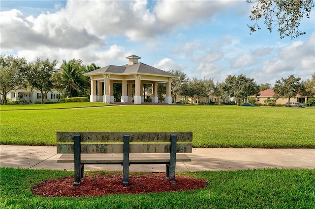 view of home's community with a lawn