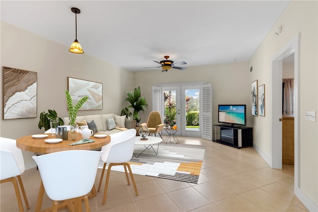 tiled living room featuring ceiling fan