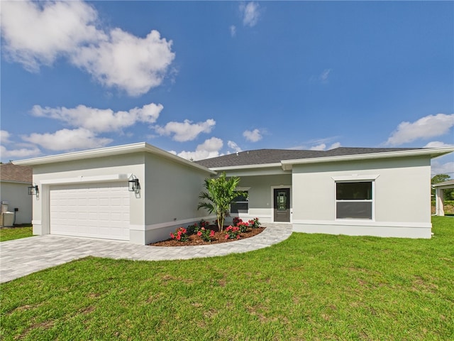 view of front of property with a front lawn, an attached garage, driveway, and stucco siding