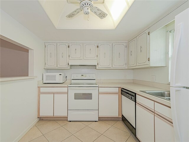 kitchen with sink, ceiling fan, light tile patterned floors, white appliances, and white cabinets