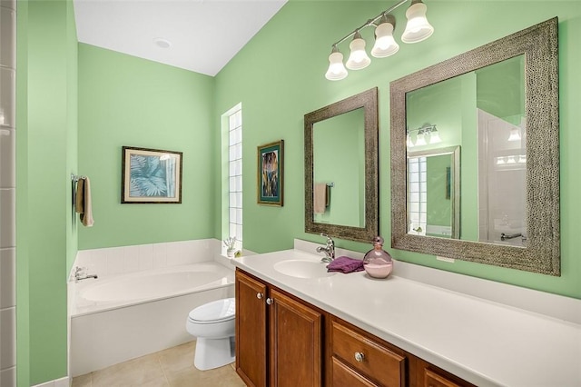 full bath with tile patterned floors, a garden tub, toilet, and vanity