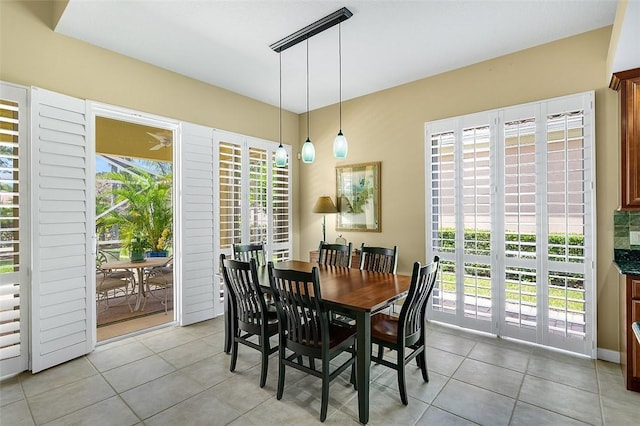 dining room featuring light tile patterned floors