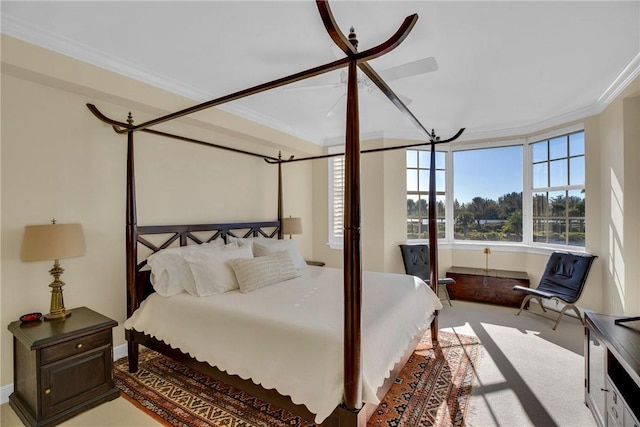 carpeted bedroom with crown molding