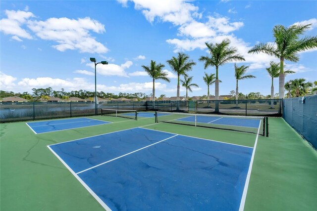 view of sport court featuring community basketball court and fence