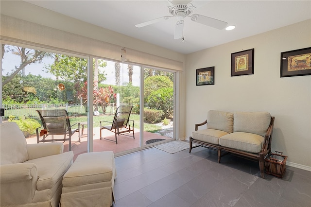 interior space featuring ceiling fan