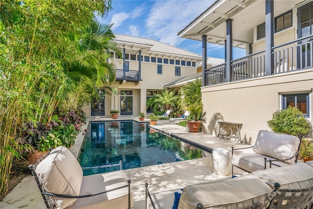 view of swimming pool featuring a patio