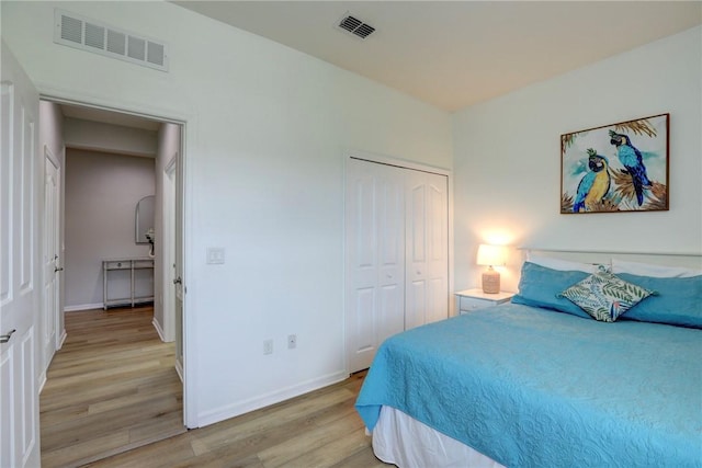 240 Barbossa Dr, Sebastian, FL 32958 - bedroom featuring light wood-type flooring and a closet