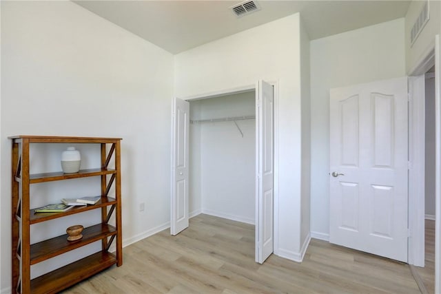 240 Barbossa Dr, Sebastian, FL 32958 - unfurnished bedroom featuring light wood-type flooring and a closet