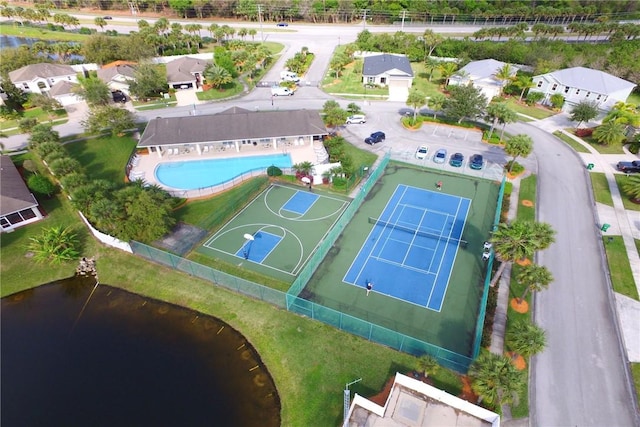 240 Barbossa Dr, Sebastian, FL 32958 - aerial perspective of suburban area with a pool area and a large body of water