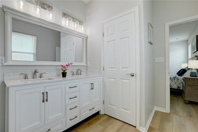 240 Barbossa Dr, Sebastian, FL 32958 - full bath with ensuite bathroom, wood finished floors, and double vanity