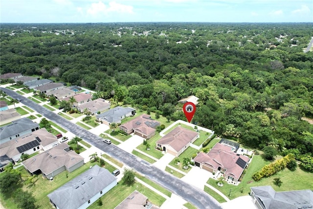 240 Barbossa Dr, Sebastian, FL 32958 - aerial view of property and surrounding area featuring nearby suburban area and a forest