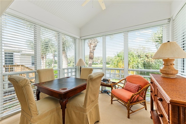 sunroom / solarium with vaulted ceiling