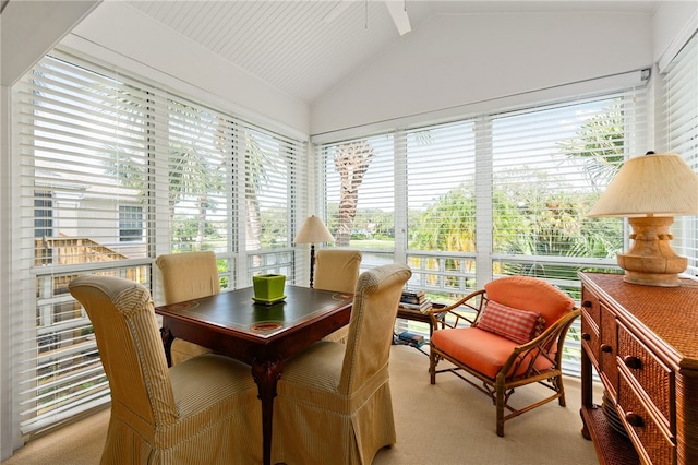 sunroom / solarium with vaulted ceiling