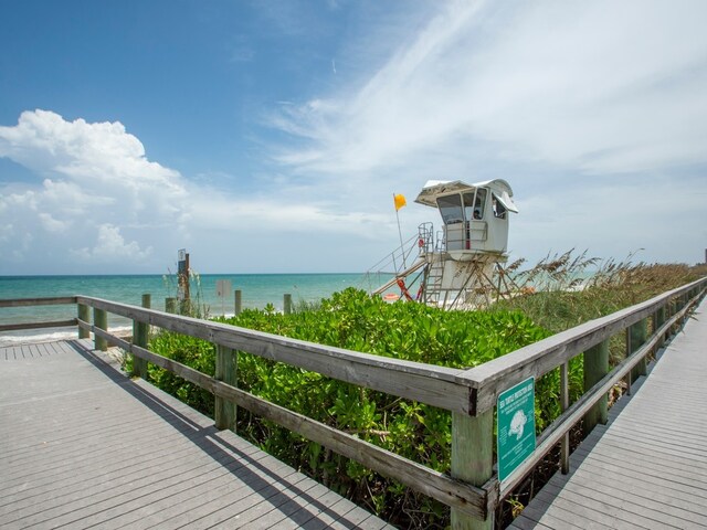 dock area with a water view