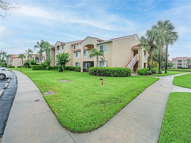 surrounding community featuring a yard