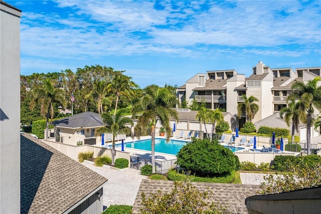 view of swimming pool featuring a patio area