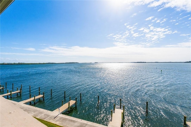 view of dock with a water view