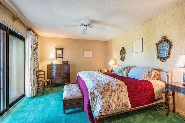 carpeted bedroom with a textured ceiling, ceiling fan, and access to outside