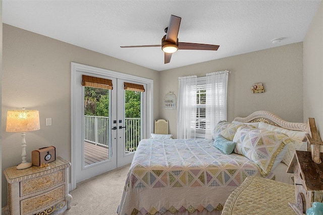 carpeted bedroom with ceiling fan, access to exterior, and french doors