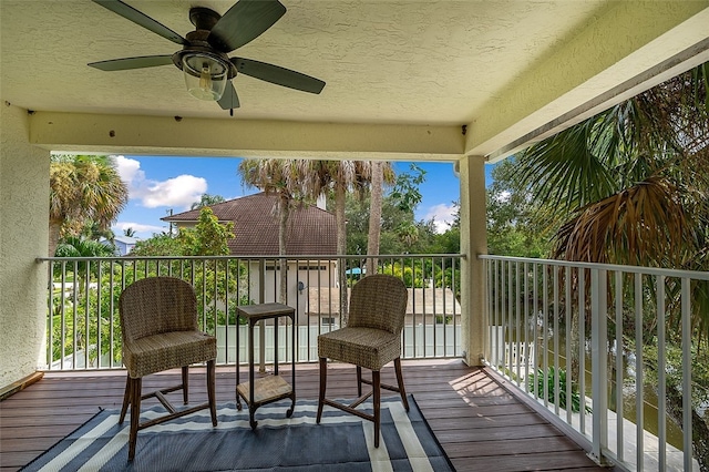 balcony featuring ceiling fan