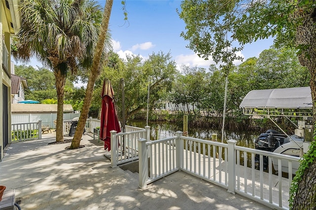 view of patio / terrace with a water view