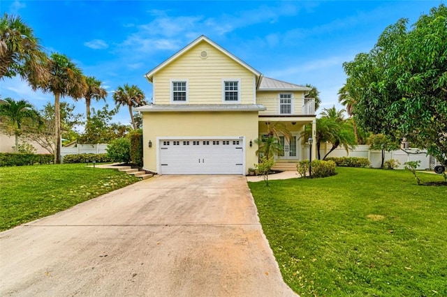 view of front property with a garage and a front yard