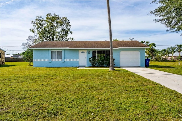 single story home featuring a garage and a front yard