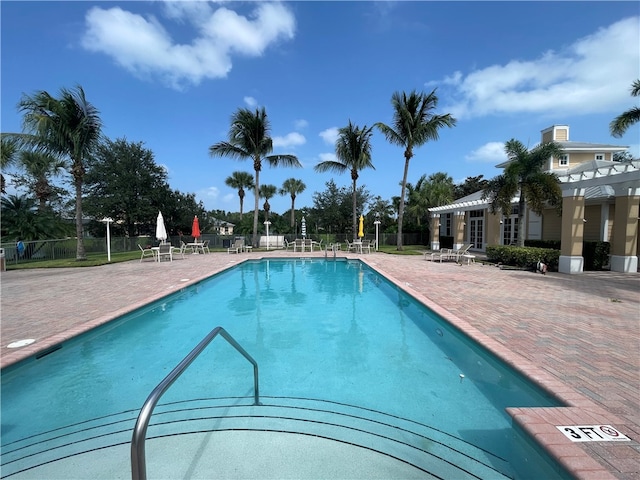 view of swimming pool featuring a patio