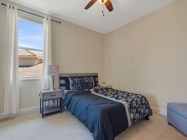 2785 Grand Isle Way SW, Vero Beach, FL 32968 - bedroom with carpet floors, baseboards, and ceiling fan