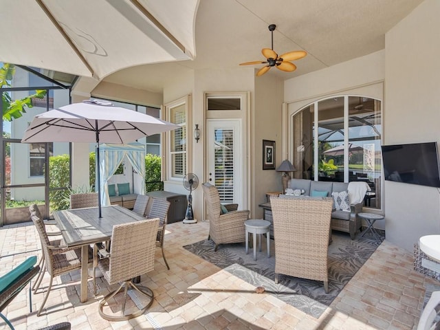 2785 Grand Isle Way SW, Vero Beach, FL 32968 - view of patio / terrace with an outdoor hangout area, outdoor dining space, glass enclosure, and a ceiling fan