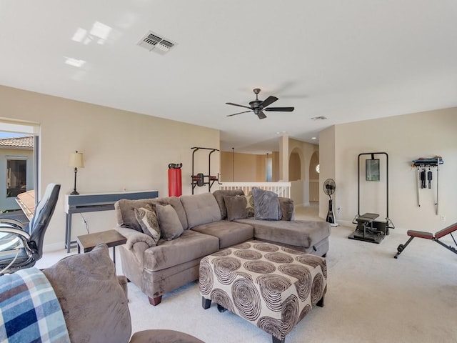 2785 Grand Isle Way SW, Vero Beach, FL 32968 - living area with light colored carpet, ceiling fan, and baseboards