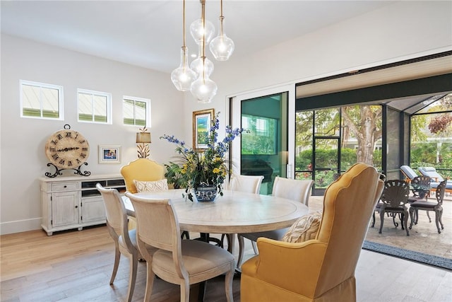 dining room with light wood-type flooring