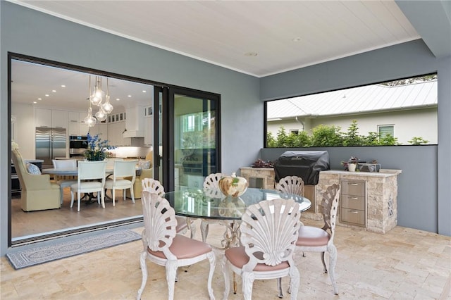 dining space featuring ornamental molding