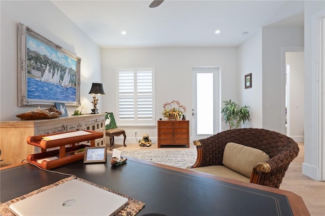 sitting room featuring light wood-type flooring