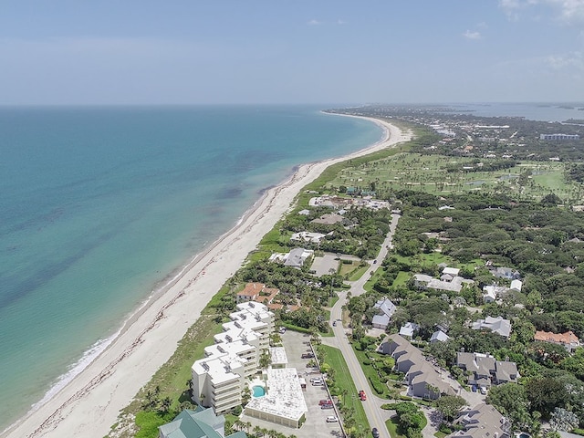 aerial view with a view of the beach and a water view