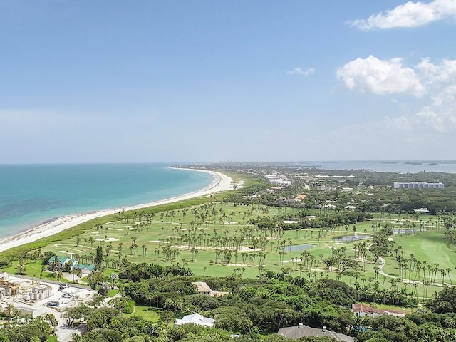 bird's eye view featuring a beach view and a water view